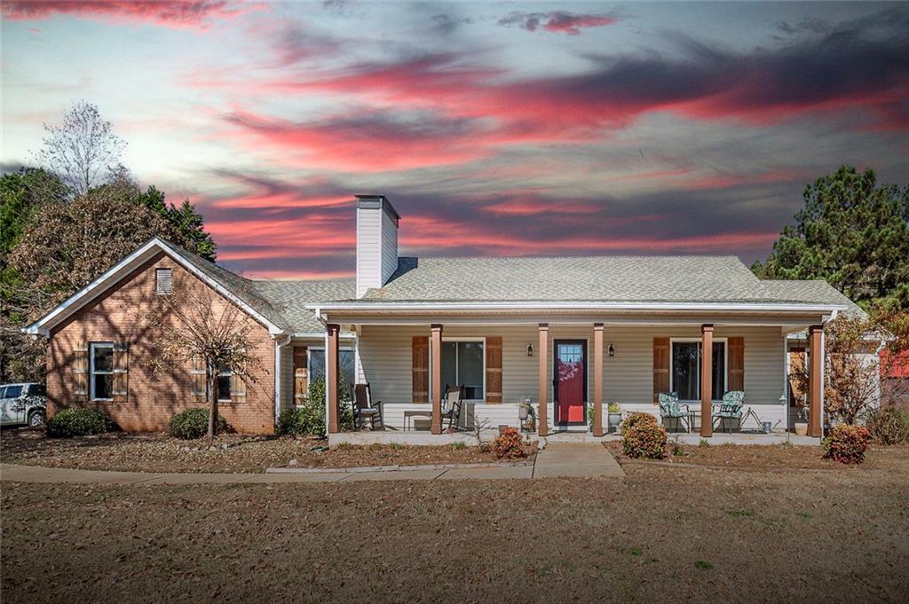 121 Harper Road McDonough, GA 30252 - Photo 1 of 38 a view of a house with a patio