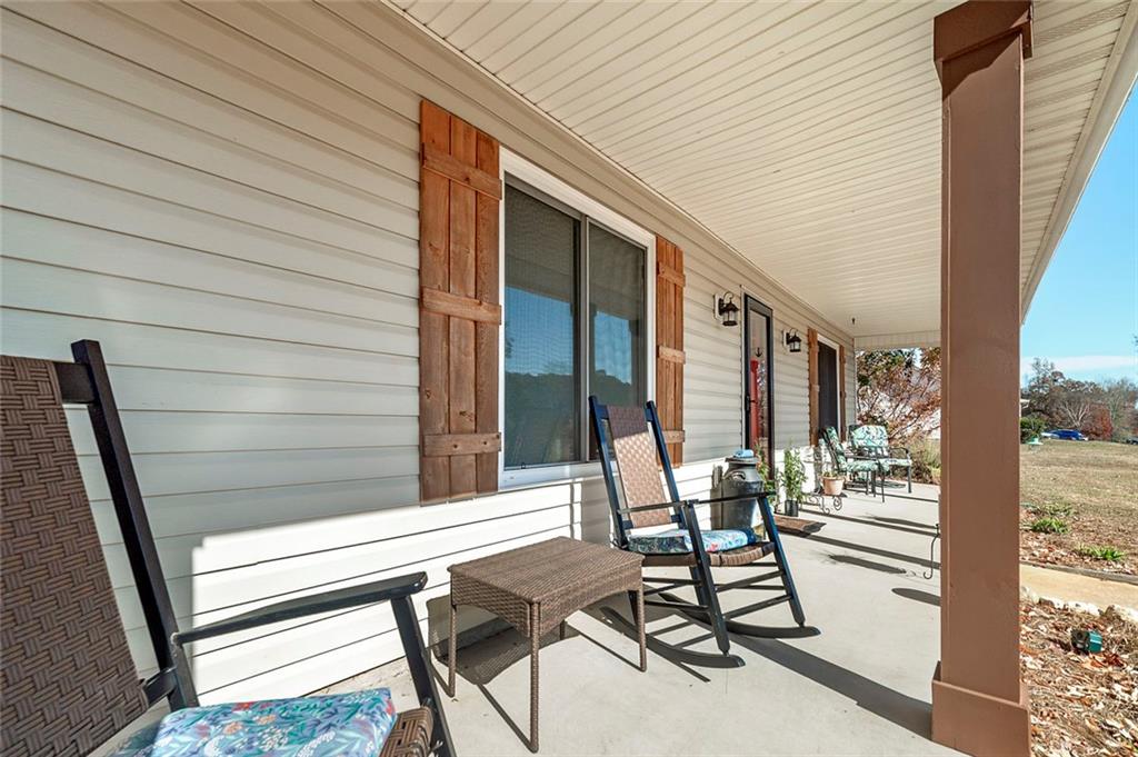 121 Harper Road McDonough, GA 30252 - Photo 11 of 38 a balcony view with a seating space