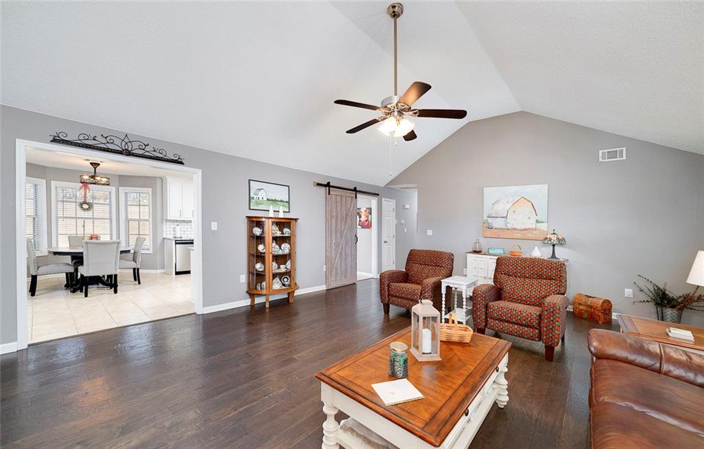 121 Harper Road McDonough, GA 30252 - Photo 15 of 38 a living room with furniture and wooden floor