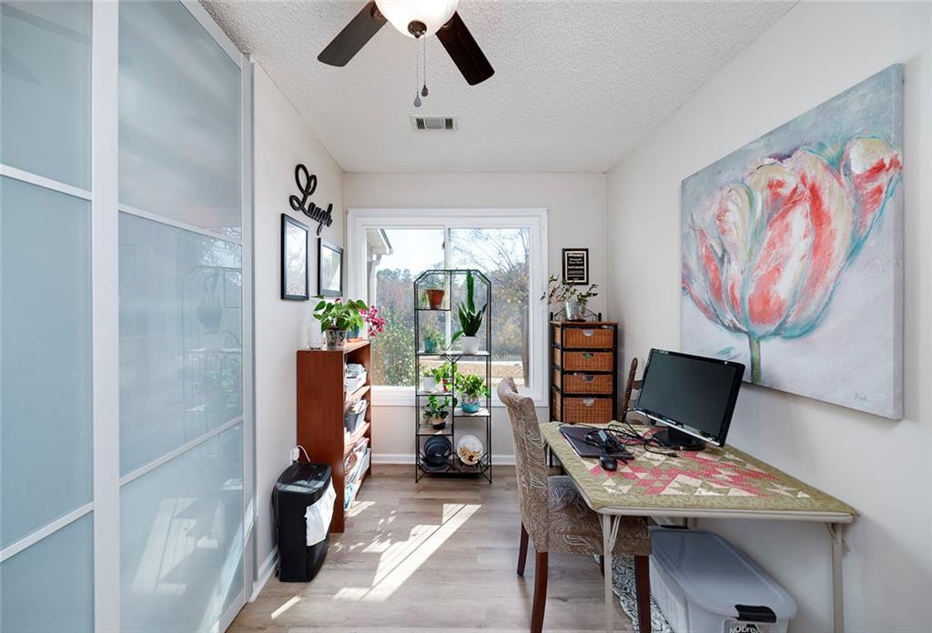 121 Harper Road McDonough, GA 30252 - Photo 24 of 38 a workspace with furniture and window