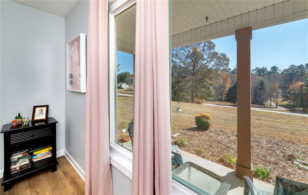 121 Harper Road McDonough, GA 30252 - Photo 31 of 38 a view of an empty room and a floor to ceiling window