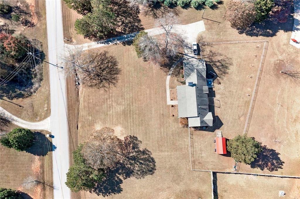 121 Harper Road McDonough, GA 30252 - Photo 35 of 38 a view of a house with a yard and garden