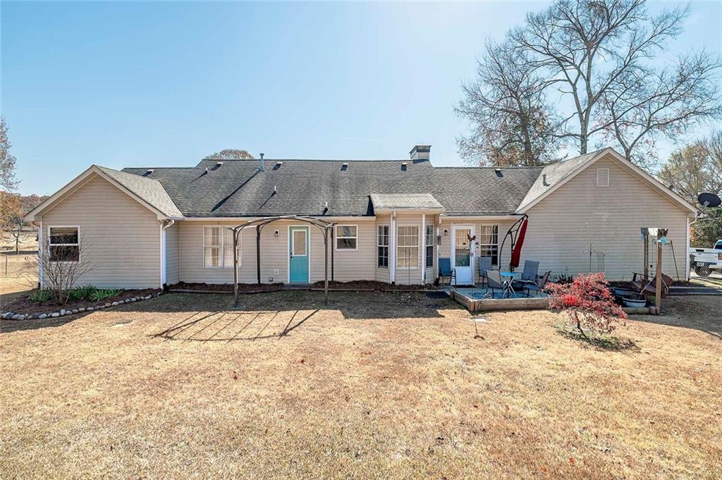 121 Harper Road McDonough, GA 30252 - Photo 6 of 38 a view of a house with snow on the wall
