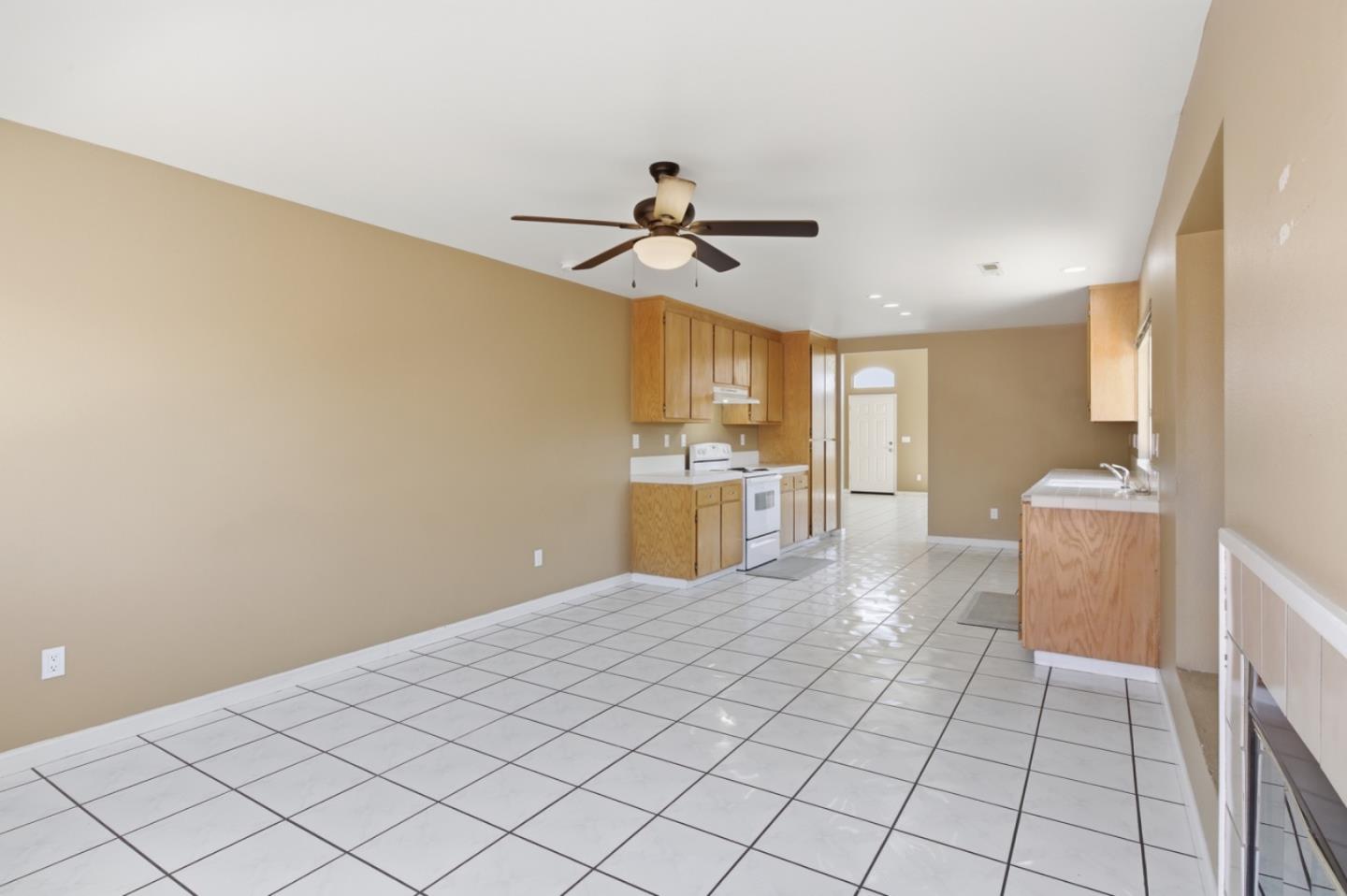 449 Sage Court Soledad, CA 93960 - Photo 4 of 17 a view of a kitchen with a sink and cabinets