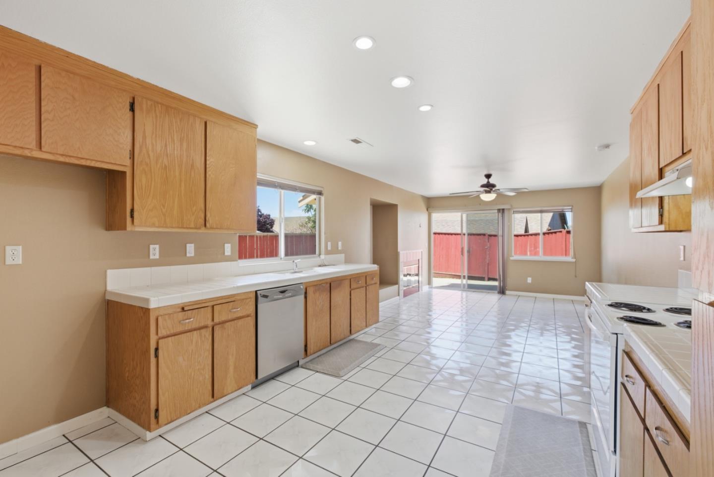 449 Sage Court Soledad, CA 93960 - Photo 6 of 17 a kitchen with a sink cabinets and window