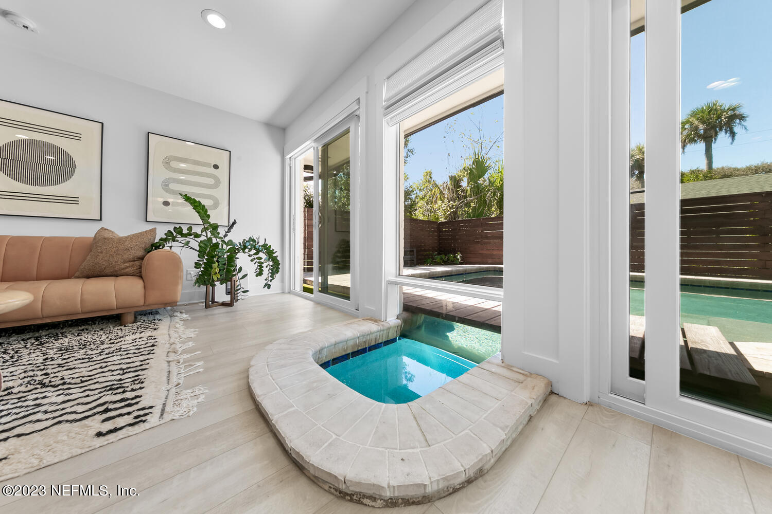 962 Ocean Boulevard Atlantic Beach, FL 32233 - Photo 31 of 63 a living room with furniture and a couch