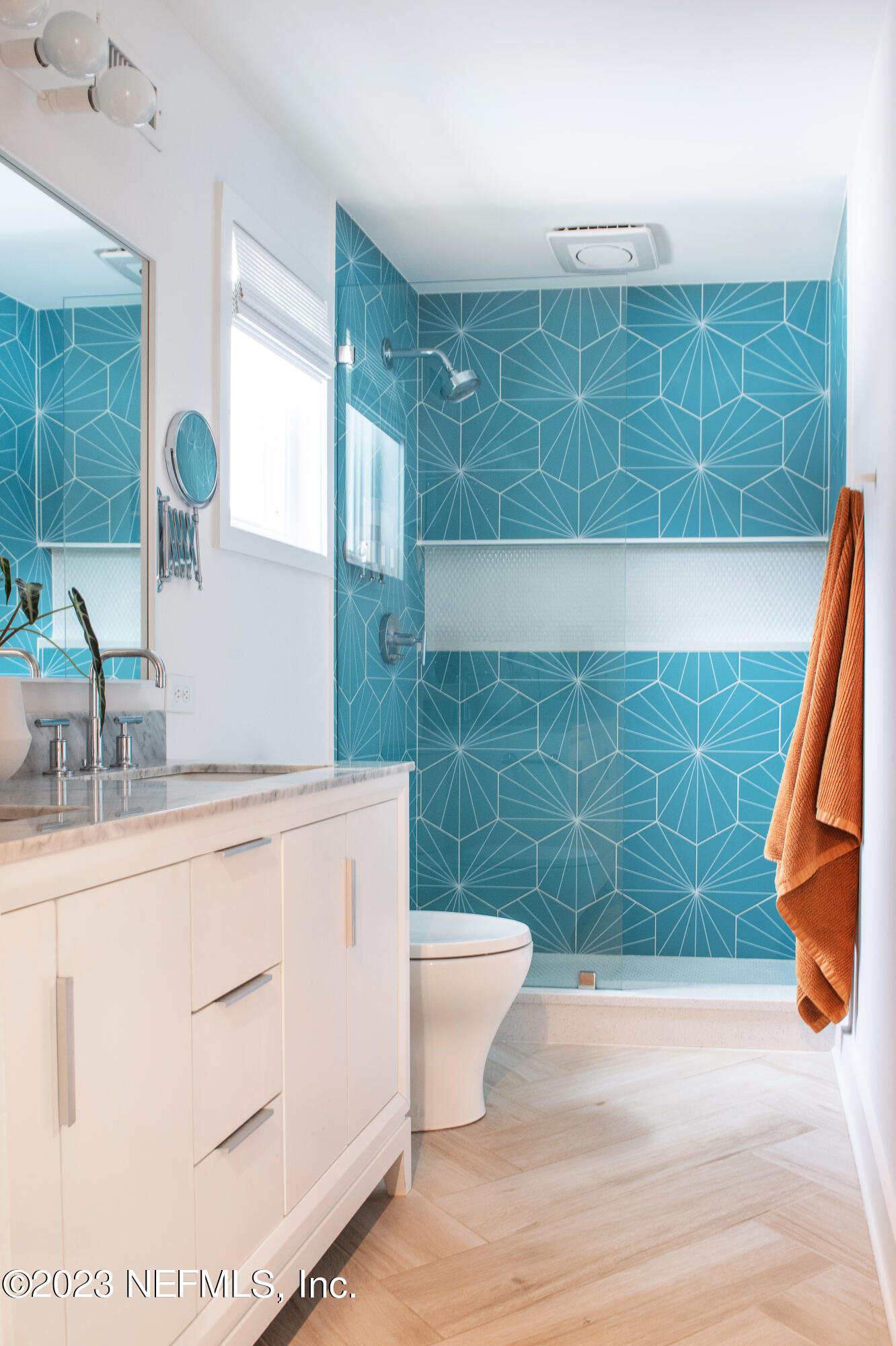 962 Ocean Boulevard Atlantic Beach, FL 32233 - Photo 37 of 63 a bathroom with a sink and a toilet