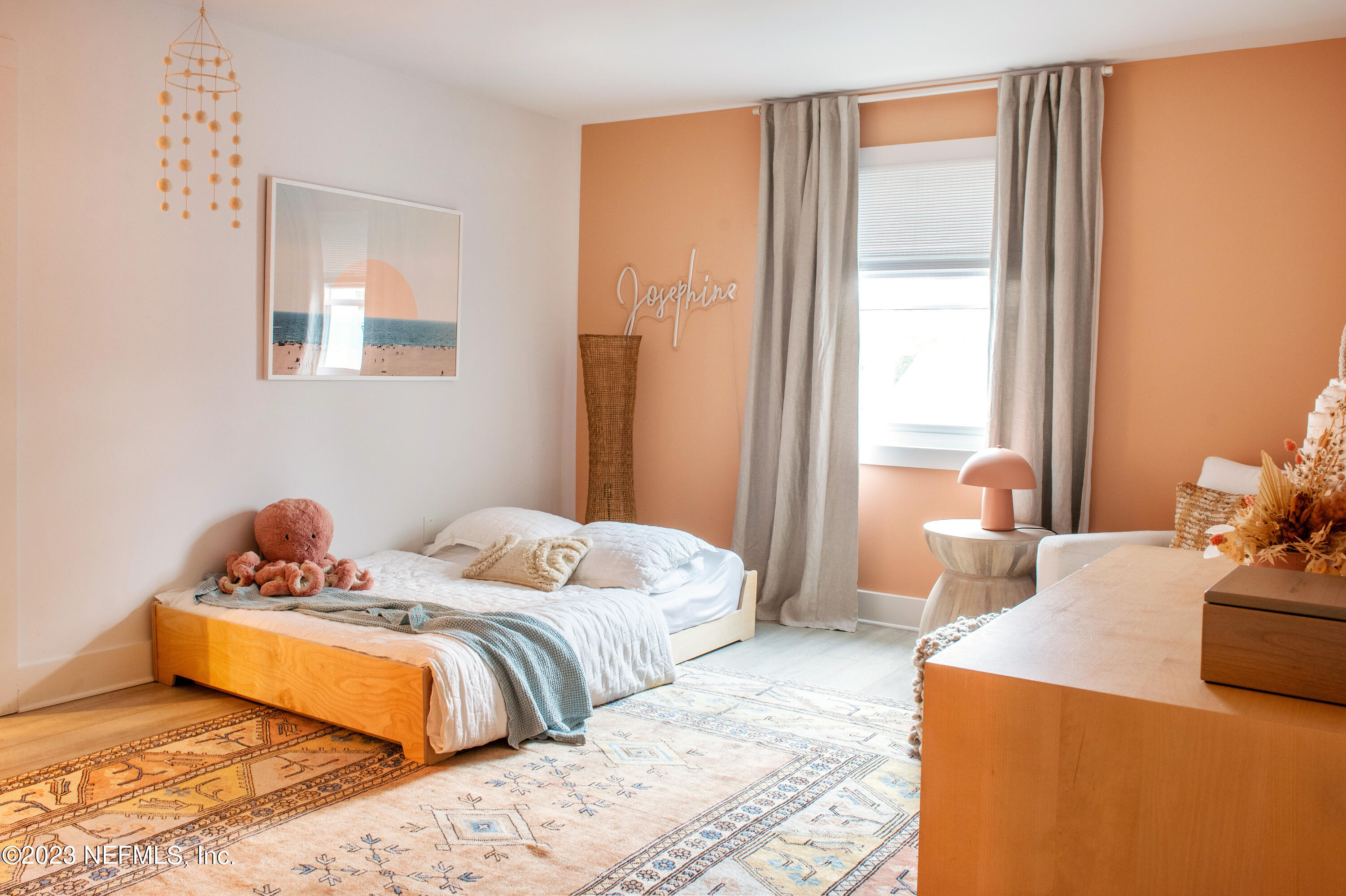 962 Ocean Boulevard Atlantic Beach, FL 32233 - Photo 43 of 63 a bedroom with bed and window