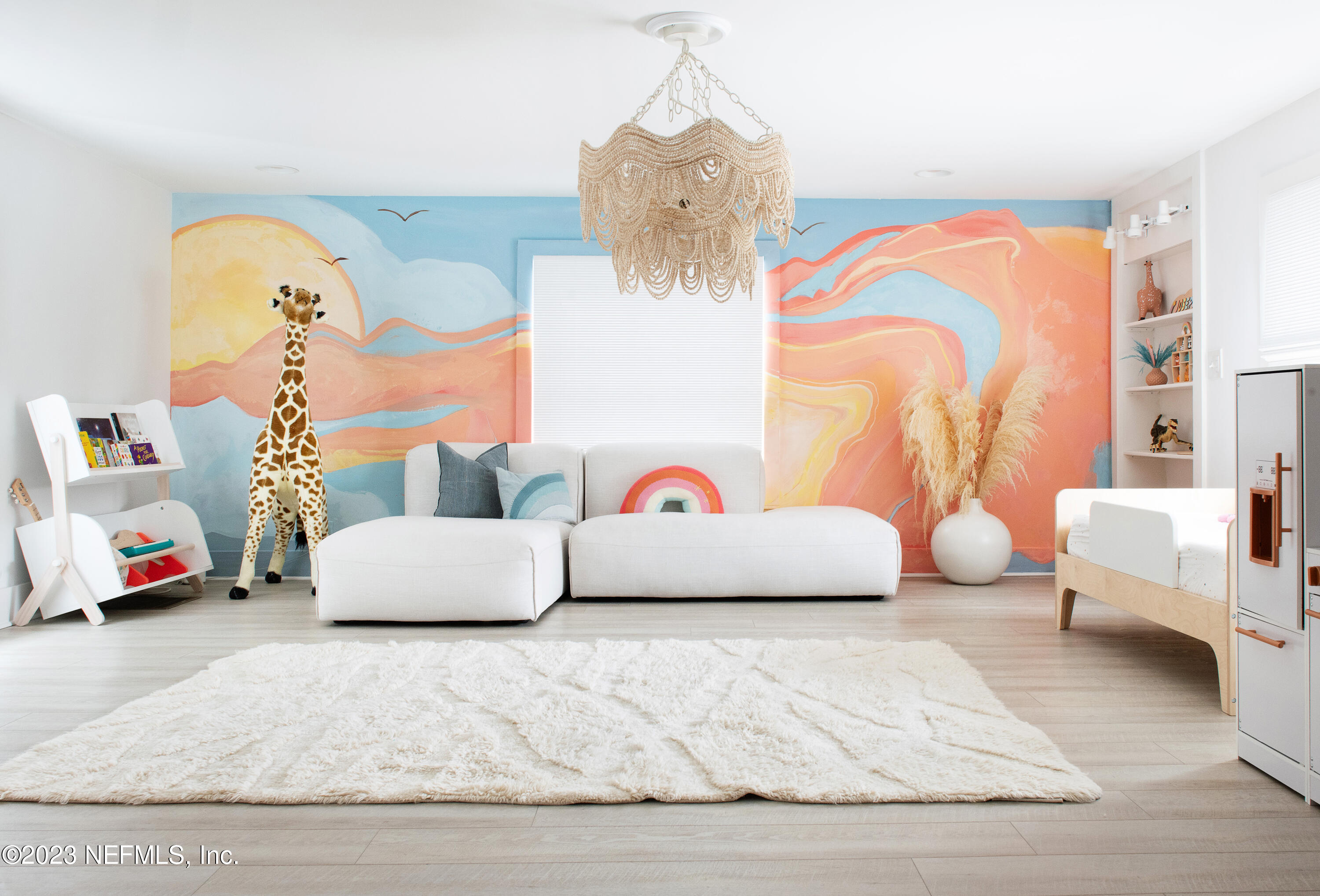 962 Ocean Boulevard Atlantic Beach, FL 32233 - Photo 44 of 63 a bedroom with furniture and a couch