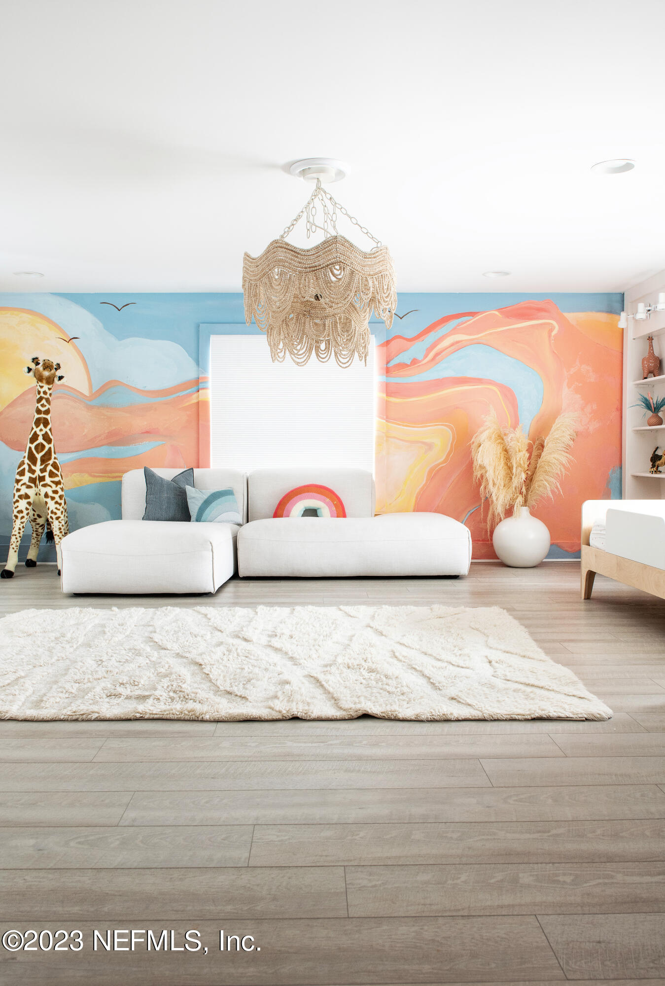 962 Ocean Boulevard Atlantic Beach, FL 32233 - Photo 45 of 63 a bedroom with a bed and lamp