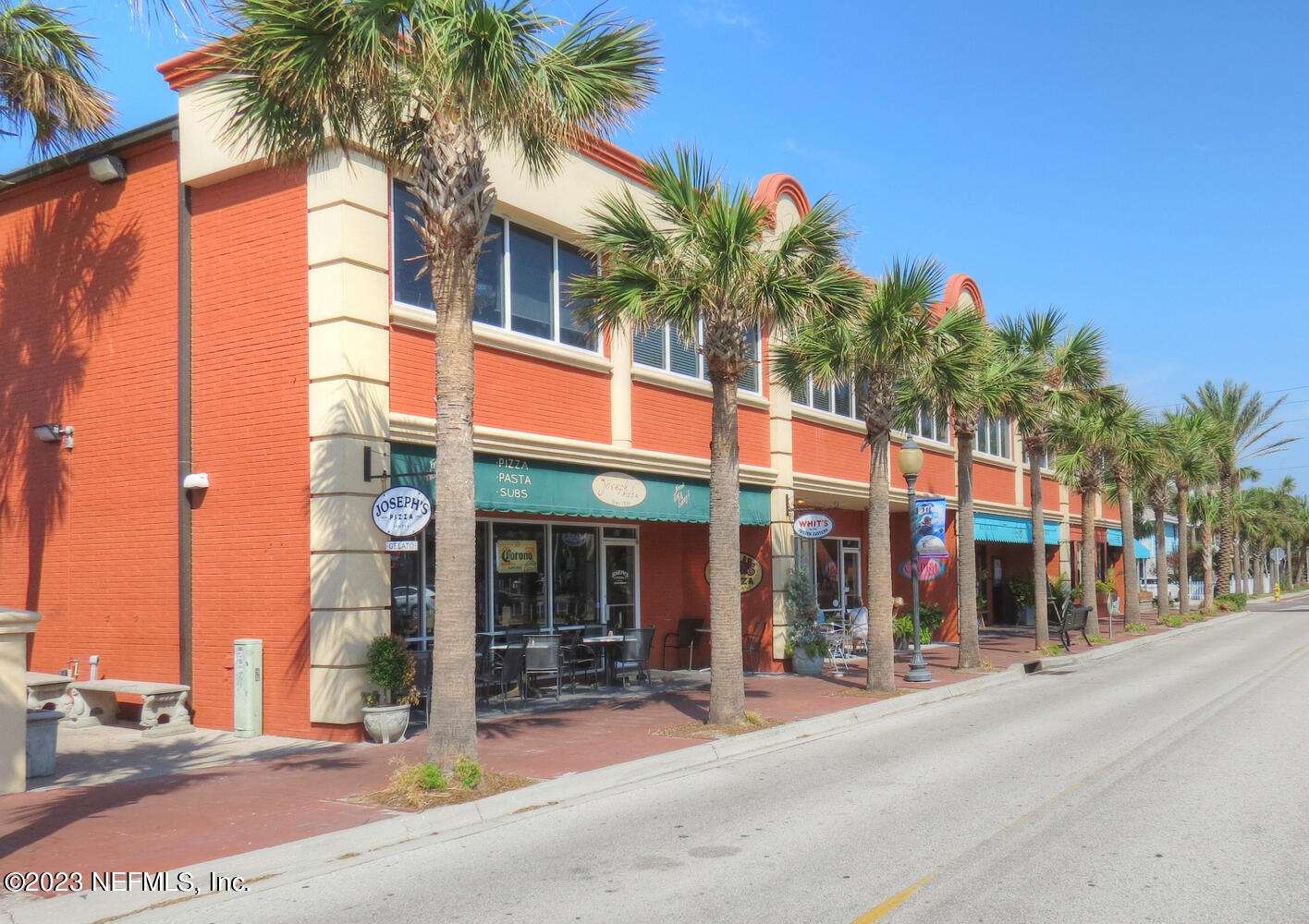 962 Ocean Boulevard Atlantic Beach, FL 32233 - Photo 59 of 63 a view of a street with a building in the background