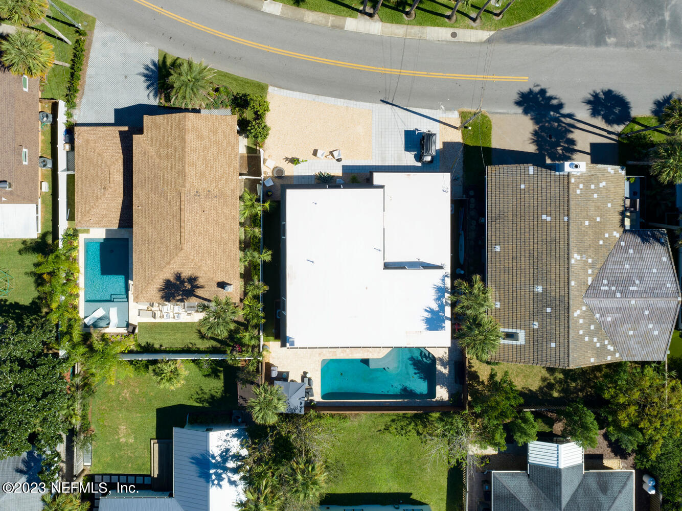962 Ocean Boulevard Atlantic Beach, FL 32233 - Photo 6 of 63 an aerial view of a house with a yard and potted plants