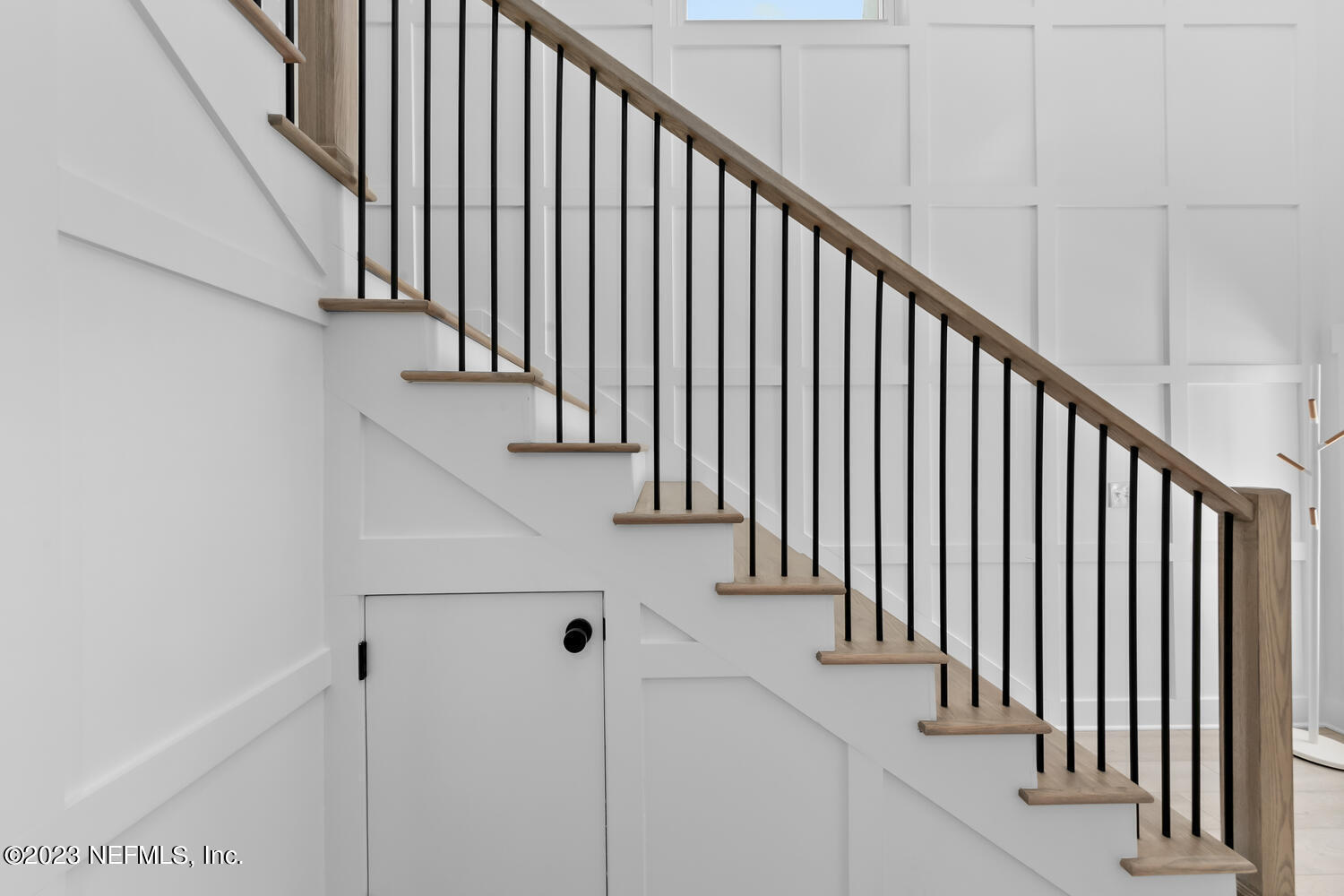 962 Ocean Boulevard Atlantic Beach, FL 32233 - Photo 10 of 63 a view of staircase with railing and white walls