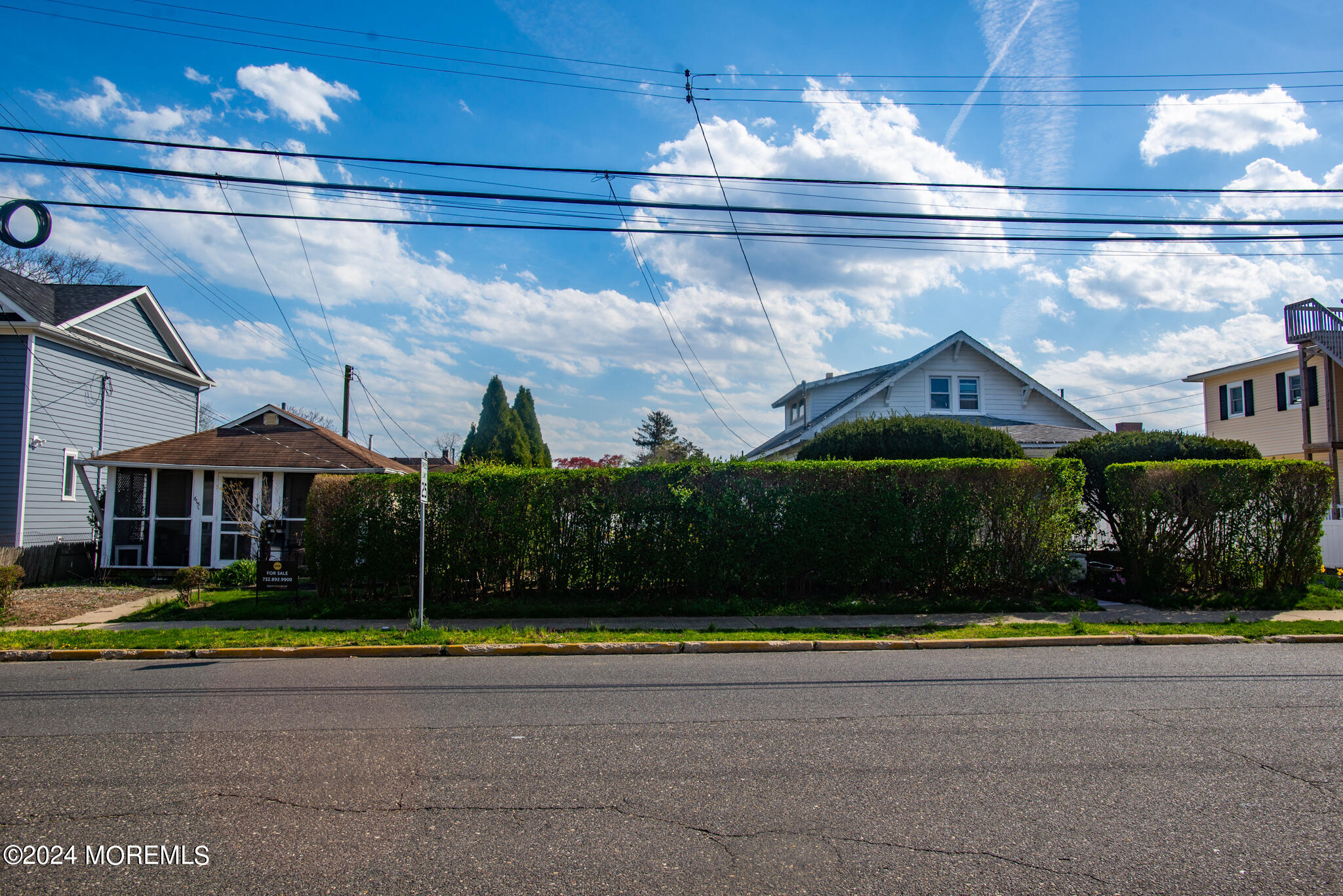 615 Ocean Road Spring Lake Heights, NJ 07762 - Photo 1 of 8 a view of a house with a yard