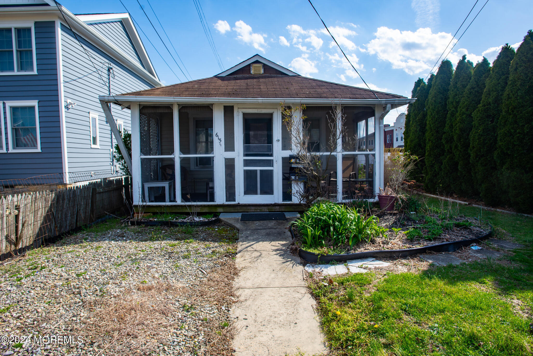 615 Ocean Road Spring Lake Heights, NJ 07762 - Photo 7 of 8 a view of a house with yard and garden