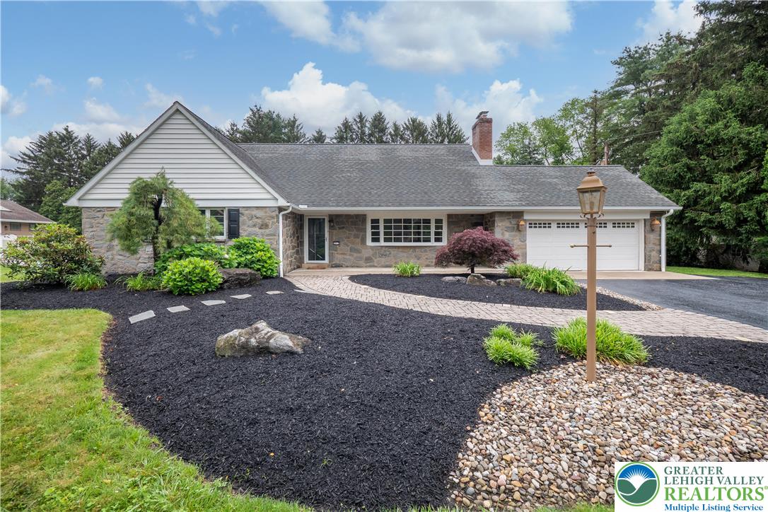 3517 Fish Hatchery Road Allentown, PA 18103 - Photo 1 of 41 a front view of a house with garden