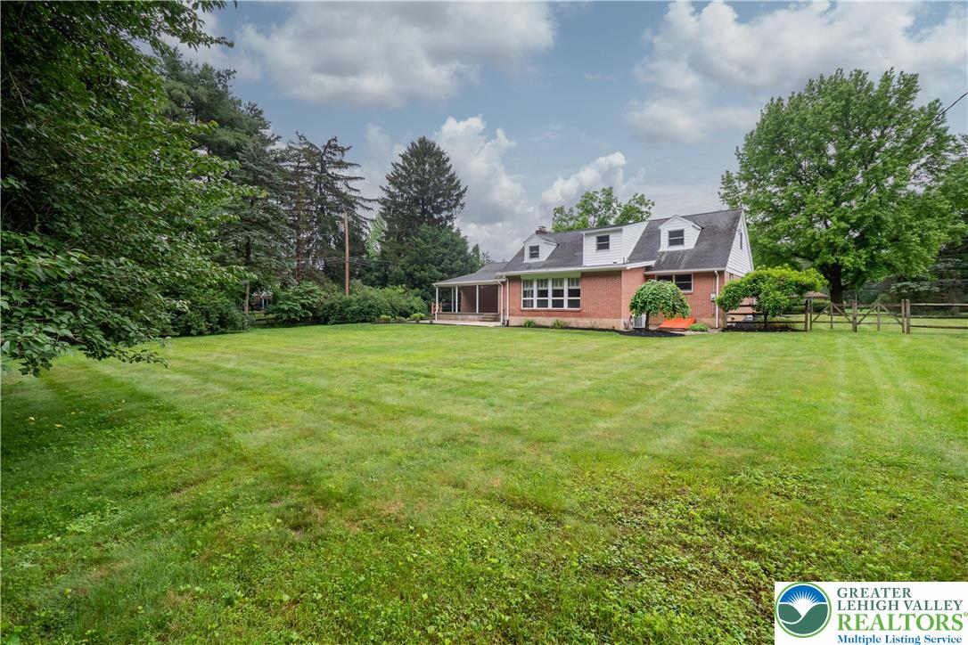 3517 Fish Hatchery Road Allentown, PA 18103 - Photo 38 of 41 a view of a house with a big yard and large trees