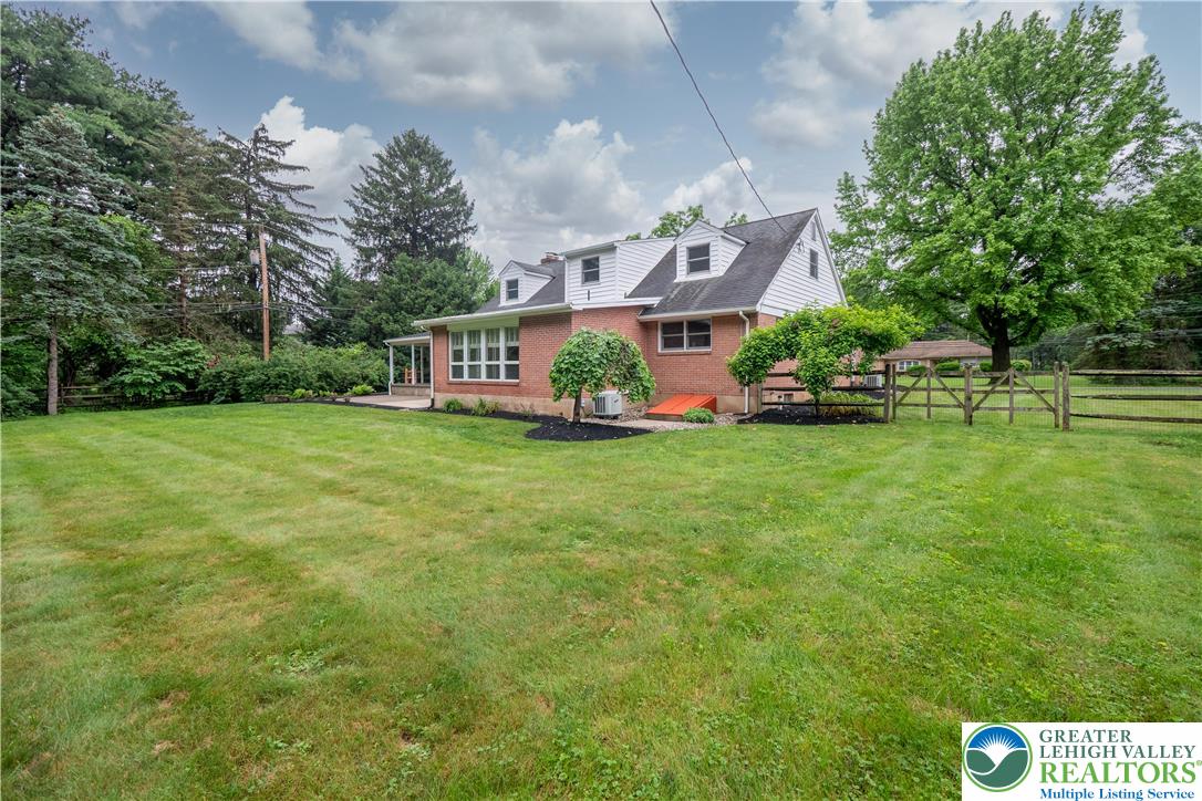 3517 Fish Hatchery Road Allentown, PA 18103 - Photo 39 of 41 a view of a house with a big yard and large trees