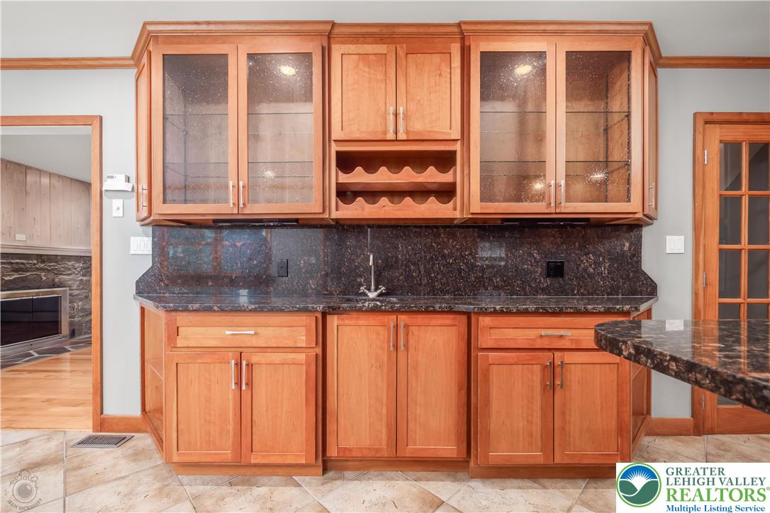 3517 Fish Hatchery Road Allentown, PA 18103 - Photo 10 of 41 a kitchen with granite countertop a sink and a stove