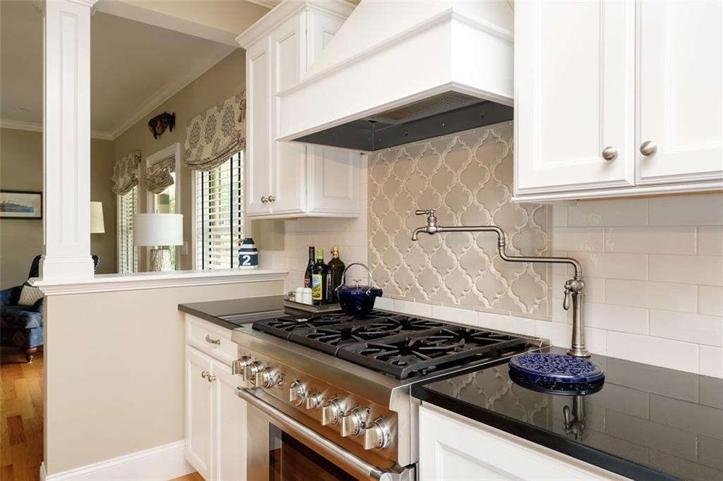 131 Shore Road Cape Neddick, ME 03902 - Photo 9 of 35 The six-burner gas range has a pot...
