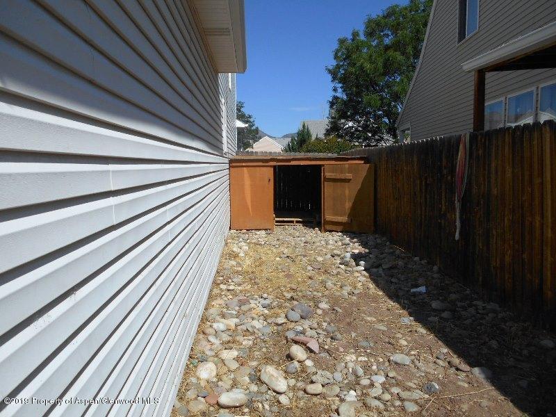 401 Evergreen Drive Rifle, CO 81650 - Photo 15 of 18 a view of a backyard