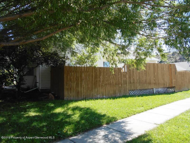 401 Evergreen Drive Rifle, CO 81650 - Photo 16 of 18 a view of backyard with wooden fence