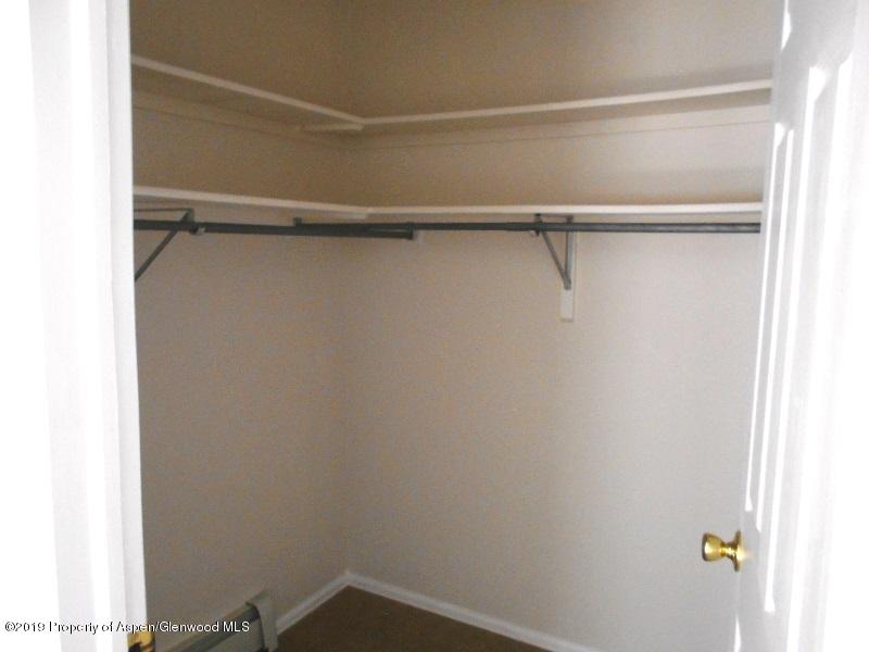 401 Evergreen Drive Rifle, CO 81650 - Photo 9 of 18 a view of a room with racks on the wall