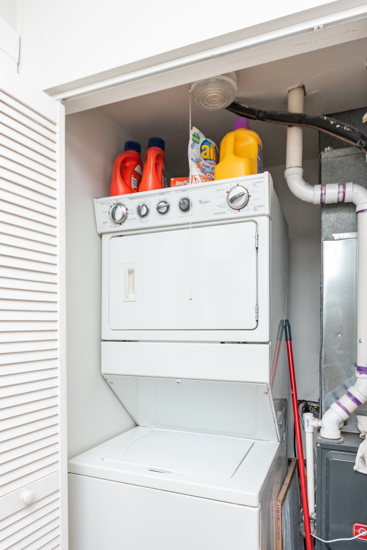 3716 North Racine Avenue, Unit 2 Chicago, IL 60613 - Photo 13 of 14 a utility room with dryer and washer
