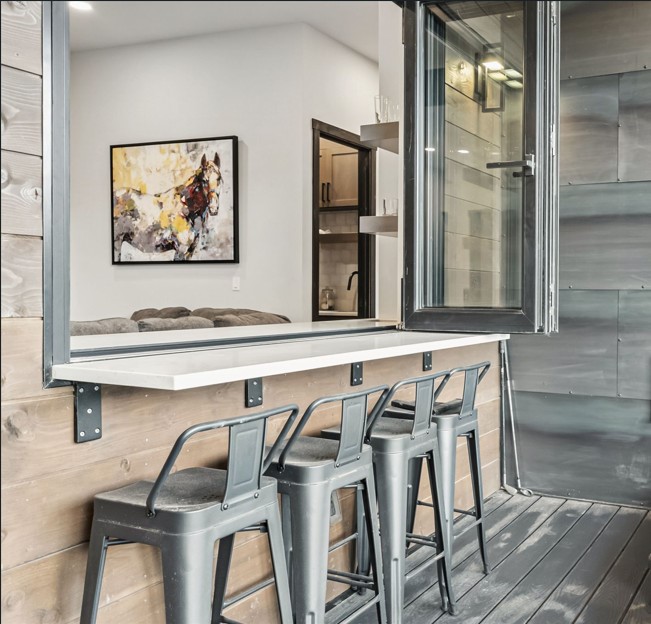 2520 Boreas Pass Road Breckenridge, CO 80424 - Photo 20 of 49 Bar area with pass-through nano-window and bar seating.