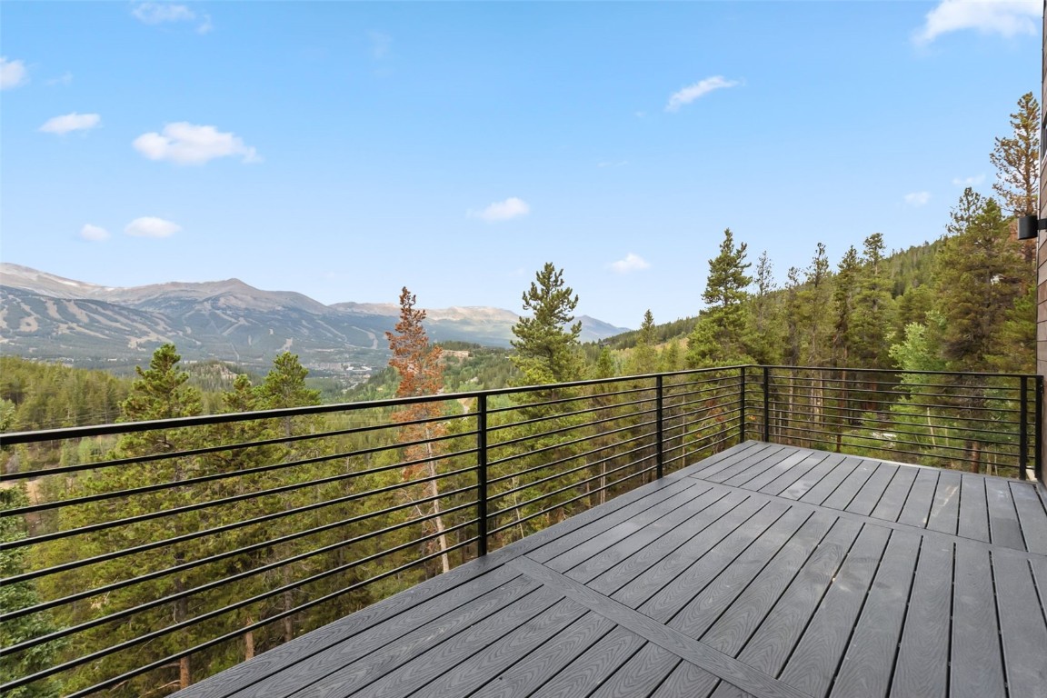 2520 Boreas Pass Road Breckenridge, CO 80424 - Photo 47 of 49 Trex deck with a mountain and forest view.