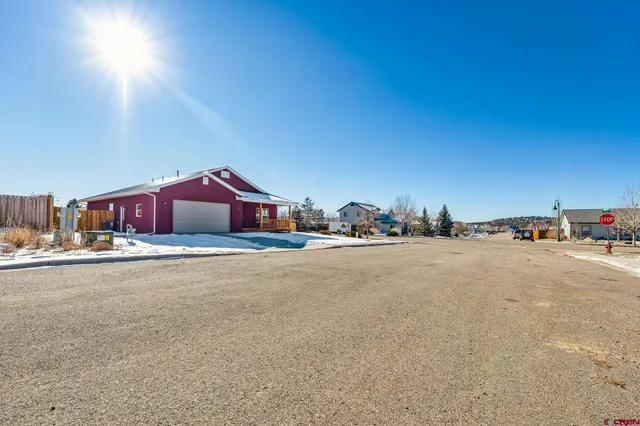 a view of a city street and a building