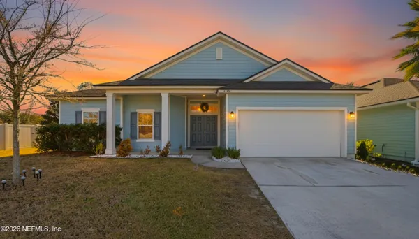front view of a house with a yard