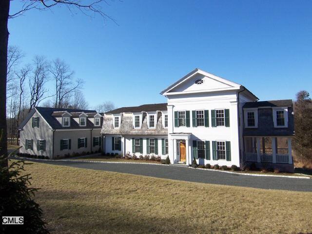 575 Hillside Road Fairfield, CT 06824 - Photo 1 of 1 a front view of a house with a yard