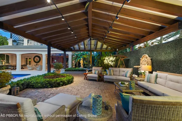 a view of a porch with furniture
