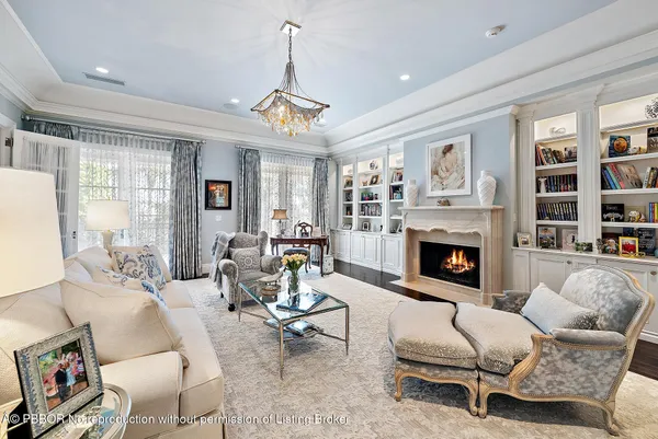 a bedroom with a large bed and a couch