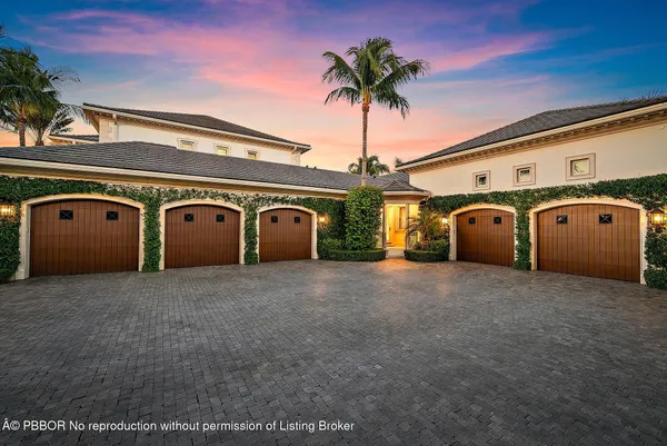 a view of a building with a yard