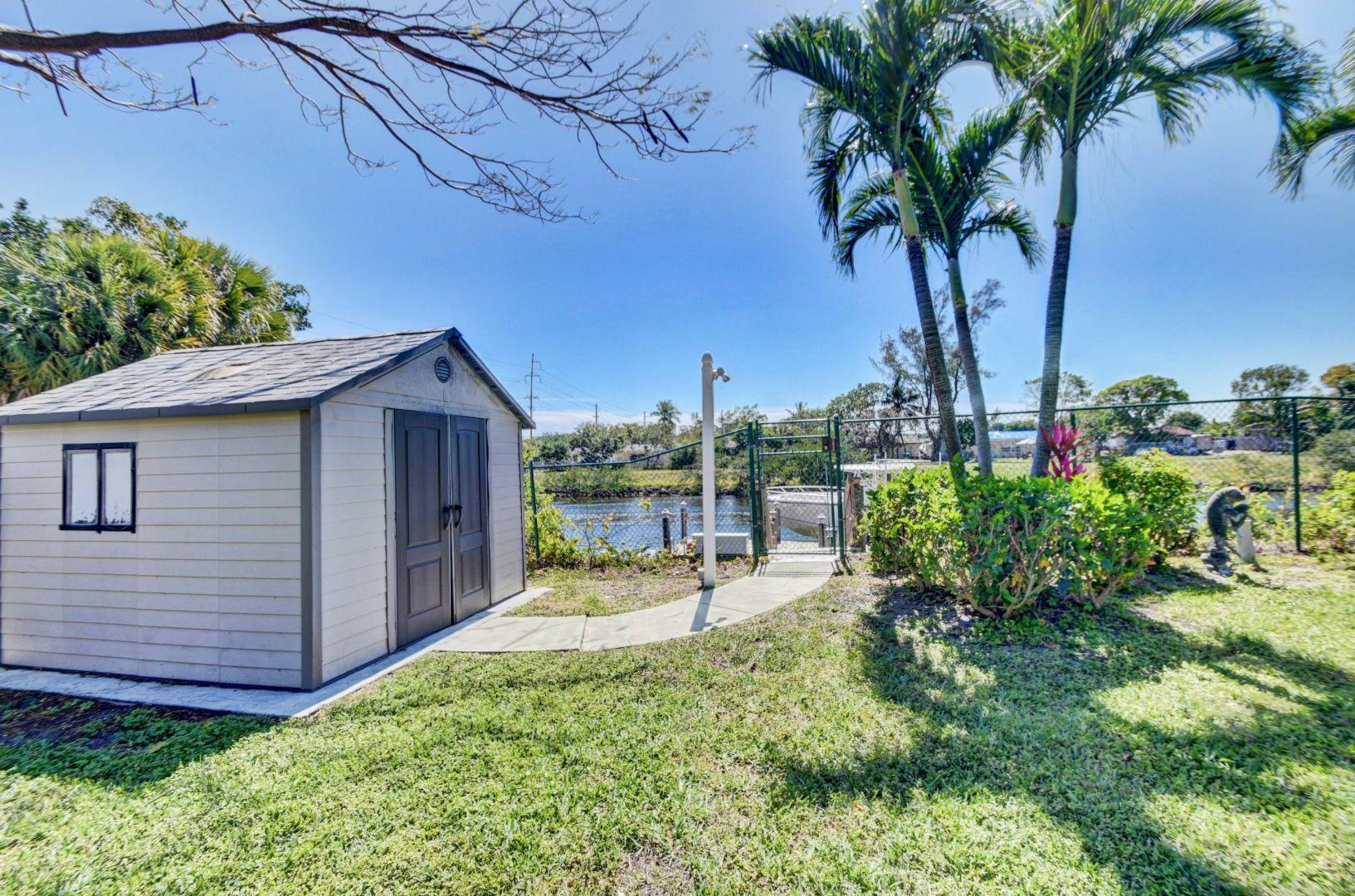 930 Southwest 21st Lane Boca Raton, FL 33486 - Photo 59 of 71 REAR SIDE