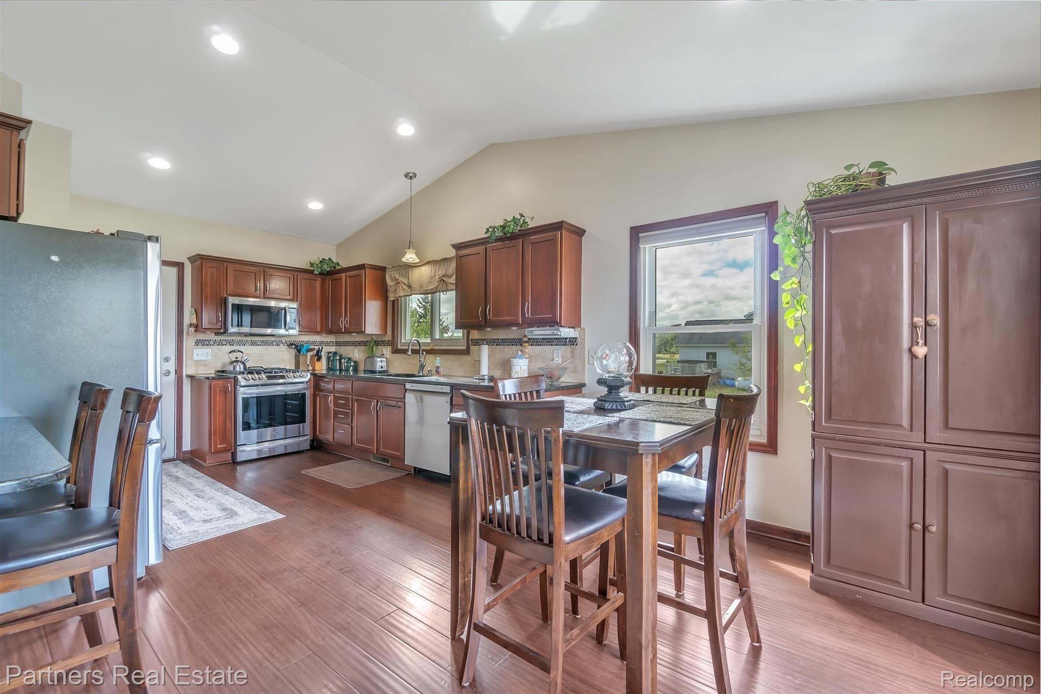 9637 North Marsh Road Fowlerville, MI 48836 - Photo 14 of 46 10-9637 N Marsh Rd-windowstill-real.jpg