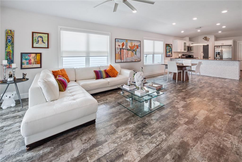 1790 Southwest 247th Street Newberry, FL 32669 - Photo 11 of 44 a living room with furniture and kitchen view