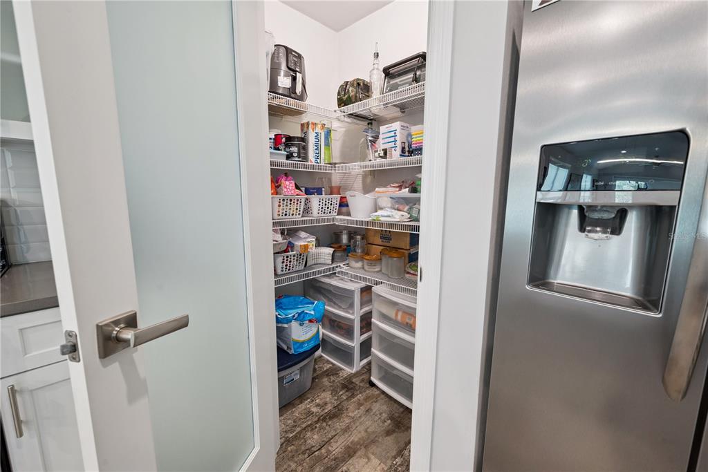 1790 Southwest 247th Street Newberry, FL 32669 - Photo 19 of 44 a view of a kitchen with fridge and rack