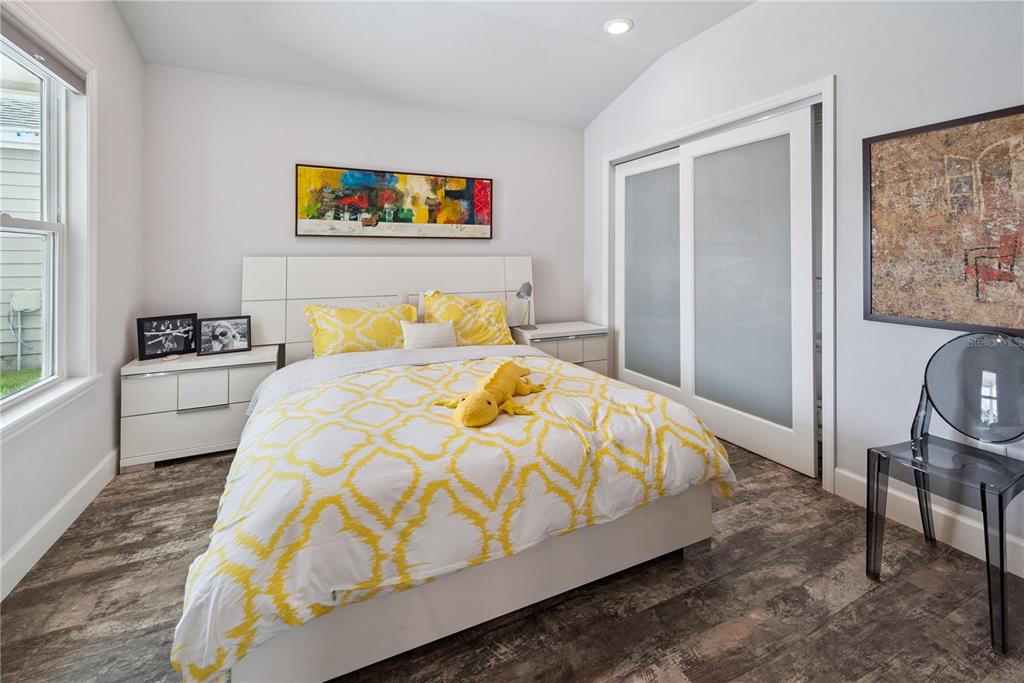 1790 Southwest 247th Street Newberry, FL 32669 - Photo 21 of 44 a bed sitting in a bedroom next to a window