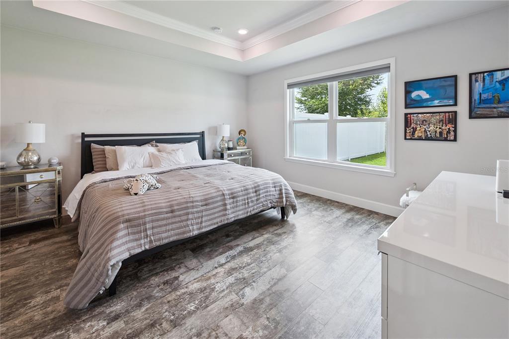 1790 Southwest 247th Street Newberry, FL 32669 - Photo 27 of 44 a bedroom with a bed and a window