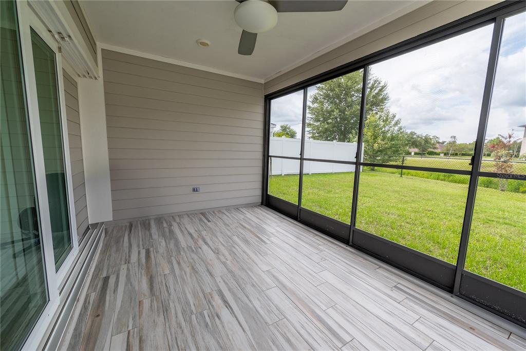 1790 Southwest 247th Street Newberry, FL 32669 - Photo 33 of 44 a view of a room with wooden floor