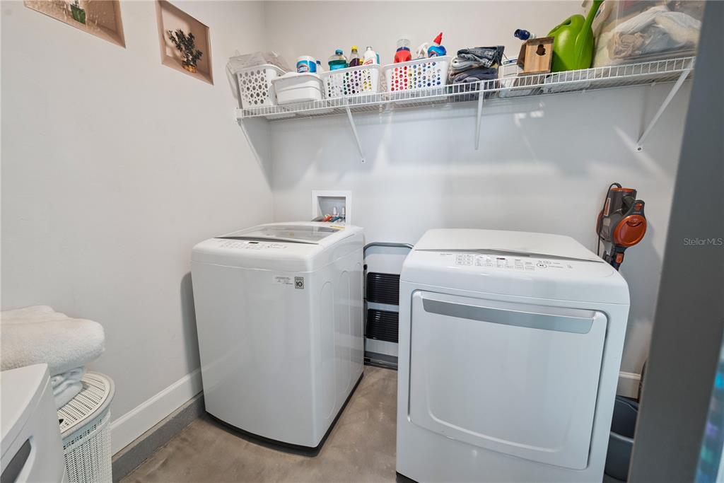 1790 Southwest 247th Street Newberry, FL 32669 - Photo 39 of 44 a utility room with dryer and washer