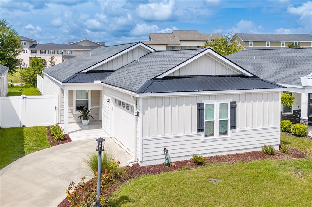 1790 Southwest 247th Street Newberry, FL 32669 - Photo 44 of 44 front view of a house with a yard