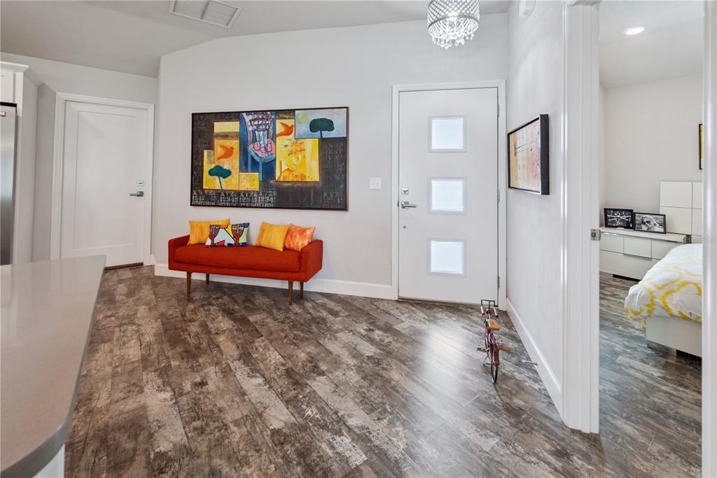 1790 Southwest 247th Street Newberry, FL 32669 - Photo 8 of 44 a living room with furniture rug and wooden floor