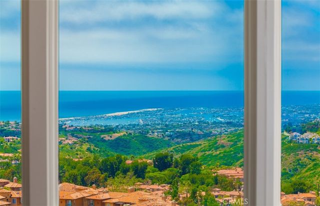 a kitchen with stainless steel appliances granite countertop a sink a stove and a sink