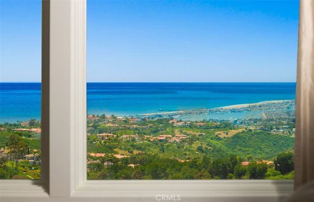 a view of a chairs and table in patio