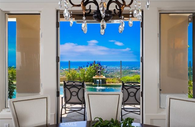 a living room with fireplace furniture and a flat screen tv