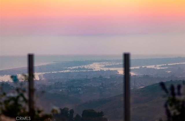 a living room with furniture fireplace and a flat screen tv